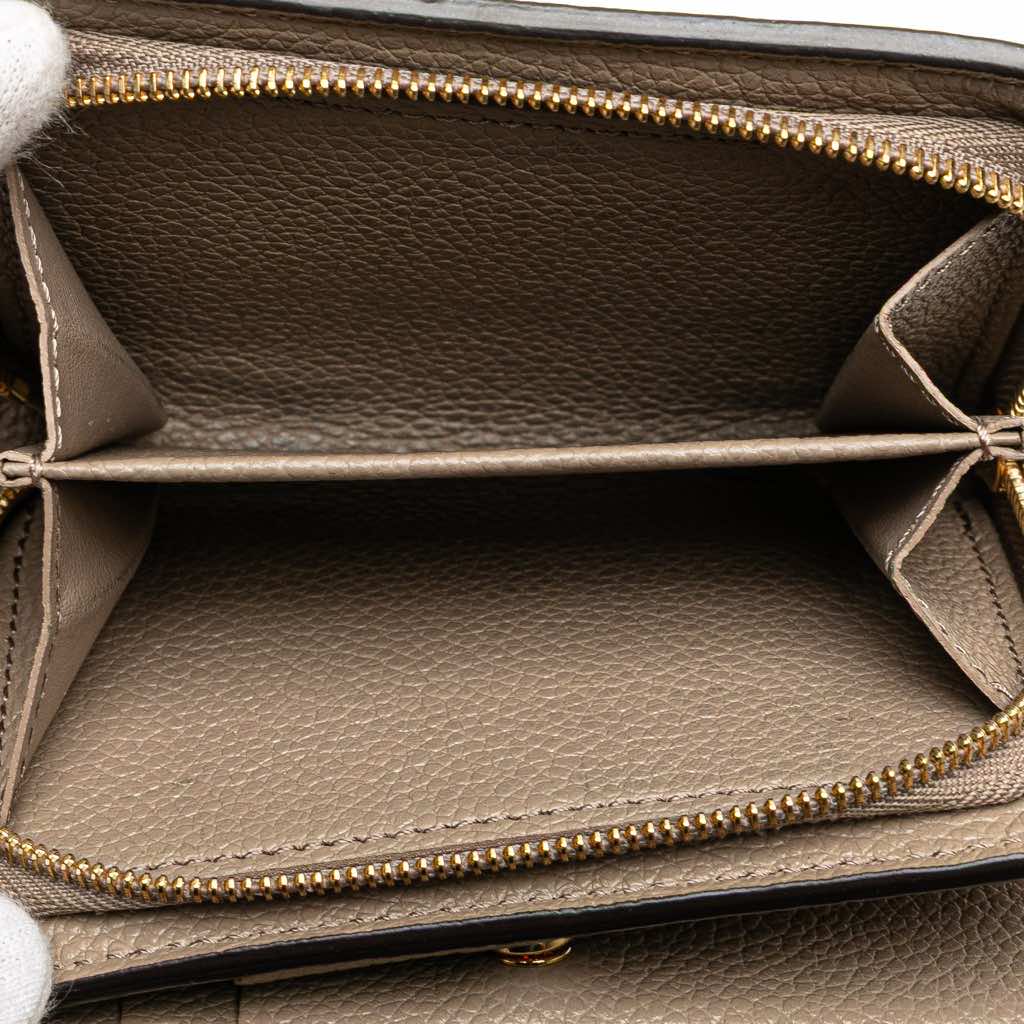 Louis Vuitton Monogram Empreinte Clea Small Wallet - Side view