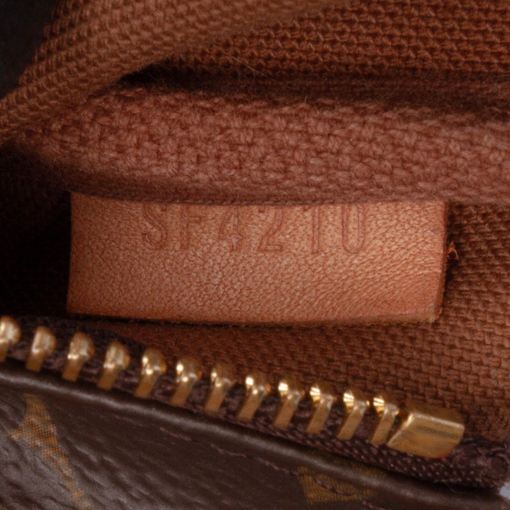 Louis Vuitton Monogram Mini Pochette Accessoires - Side view