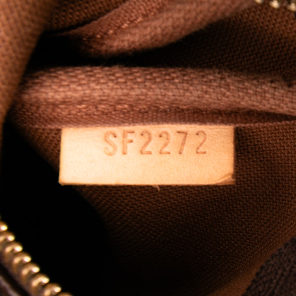 Louis Vuitton Monogram Mini Pochette Accessoires - Detail 1