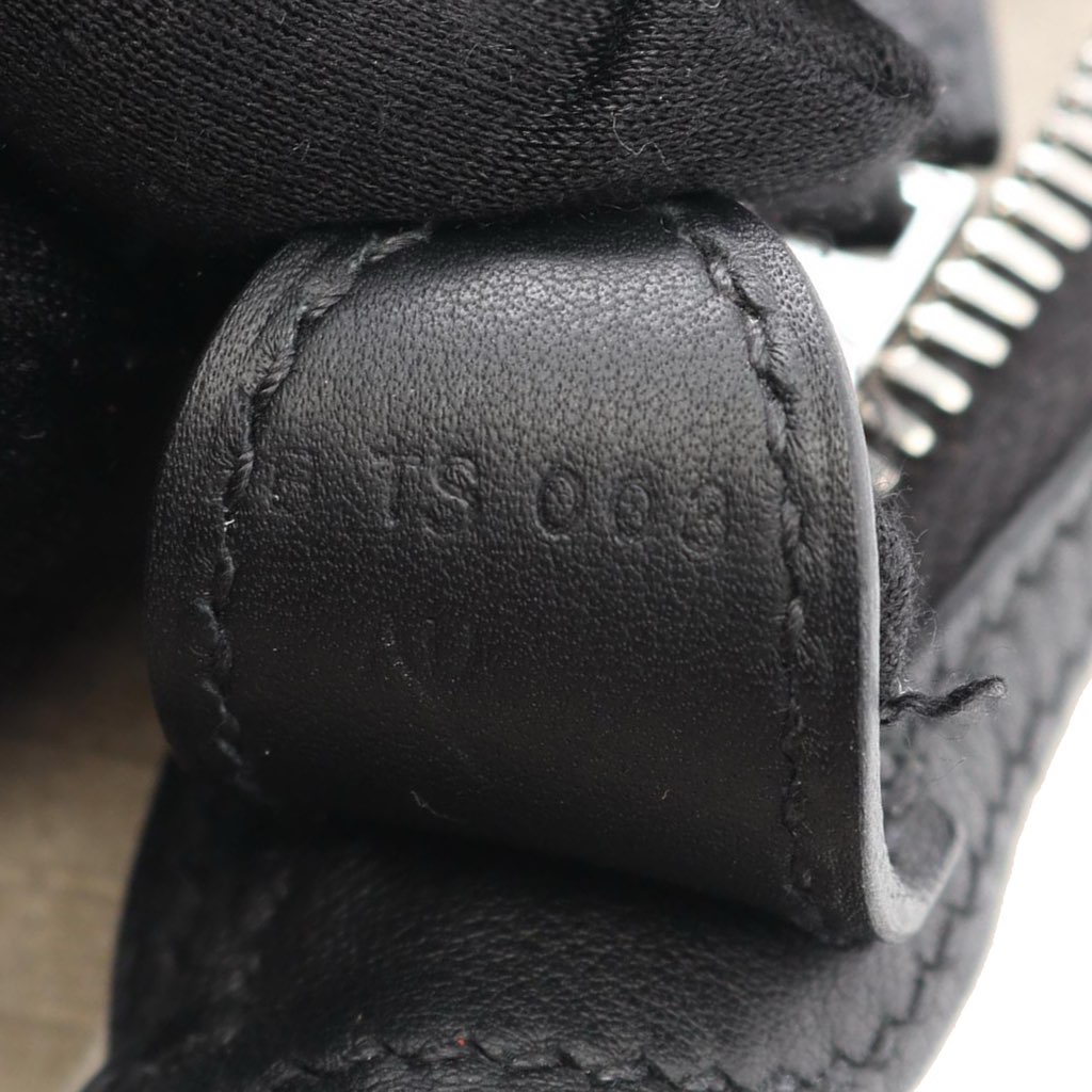 Hermès Bivouac and Swift Allback Backpack - Side view