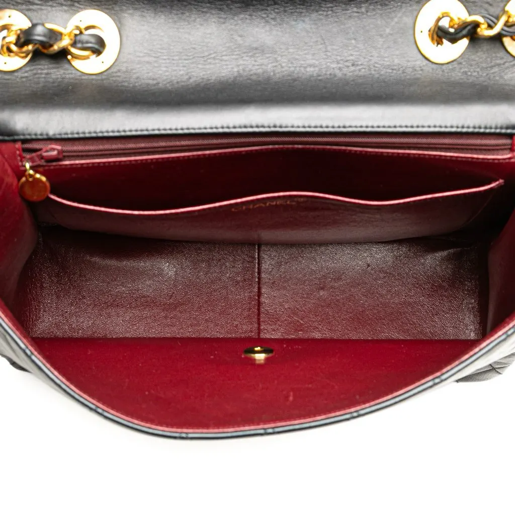 Chanel Maxi XL Classic Lambskin Single Flap Black Leather Good - Model View