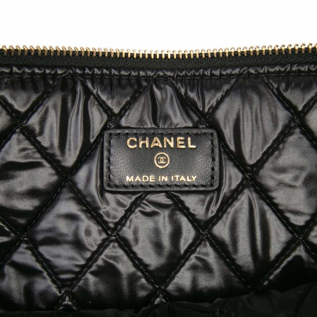 Chanel Large Quilted Lambskin Camellia O Case Clutch - Side view