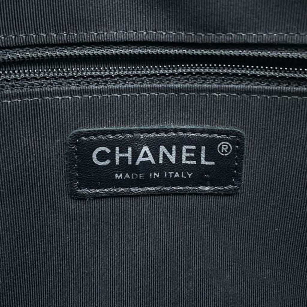 Chanel Small Tweed and Lambskin Girl Clutch on Chain - Side view