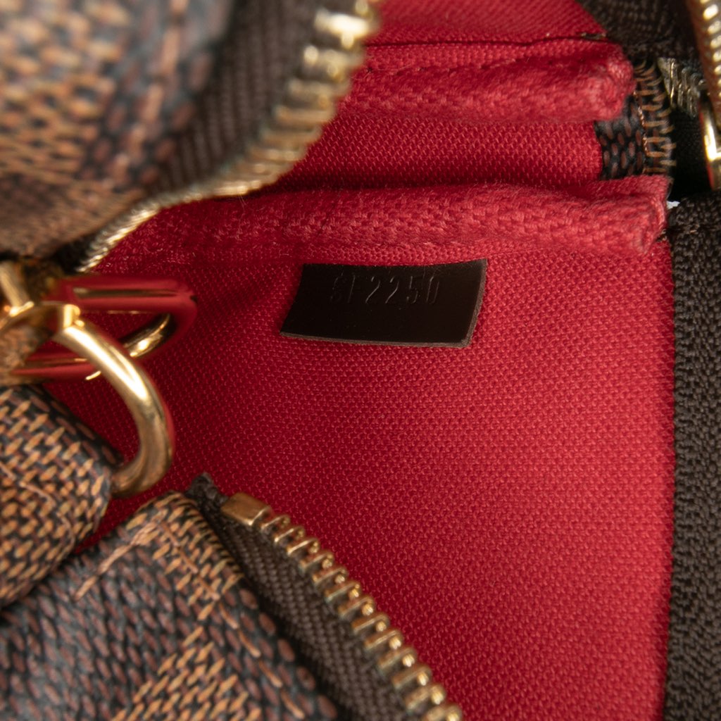 Louis Vuitton Damier Ebene Mini Pochette Accessoires - Side view