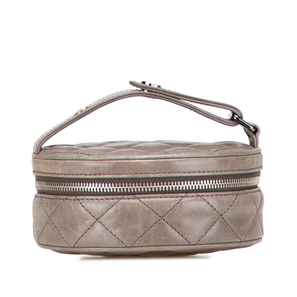 Chanel CC Quilted Aged Calfskin Round Clutch