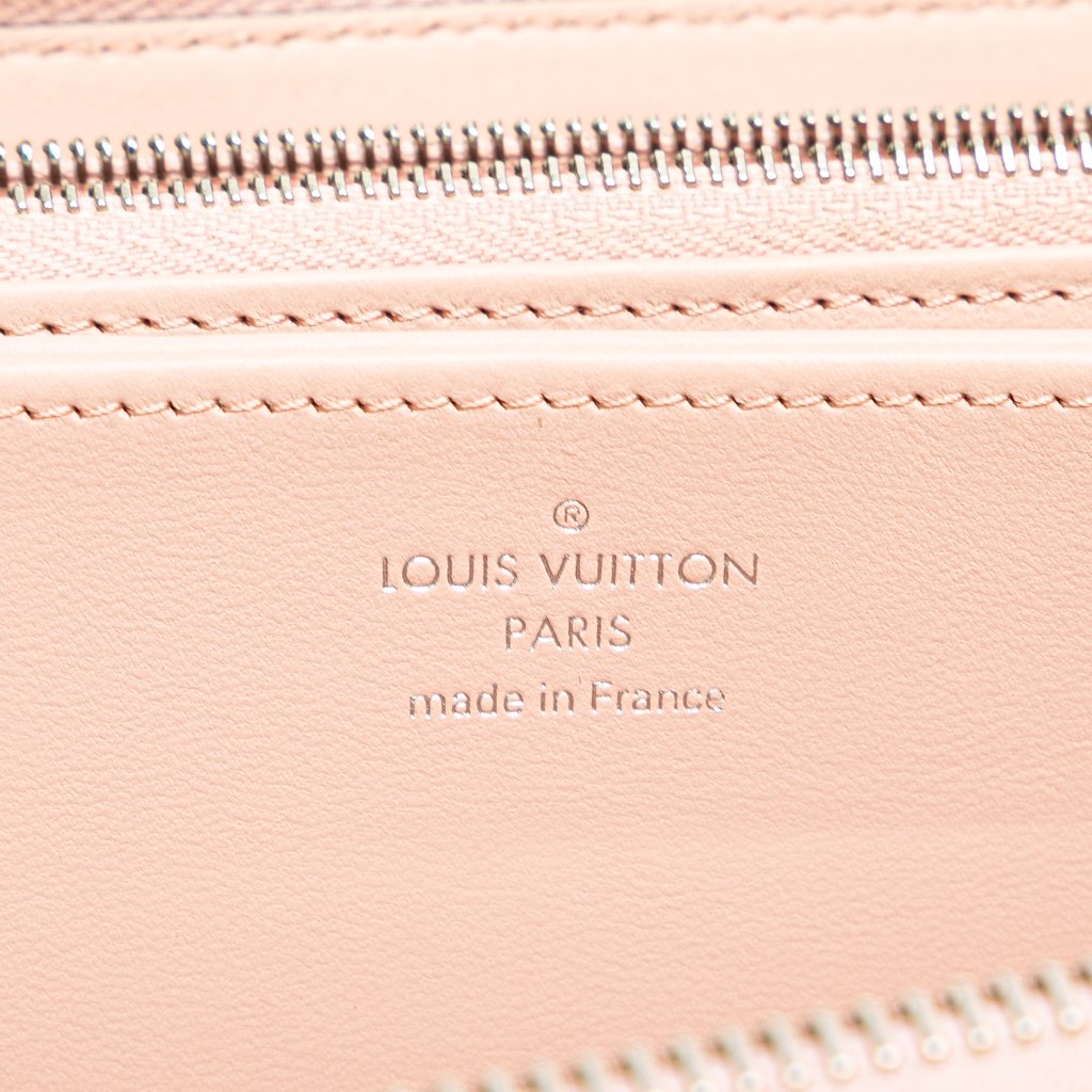 Louis Vuitton Monogram Mahina Zippy Wallet - Side view