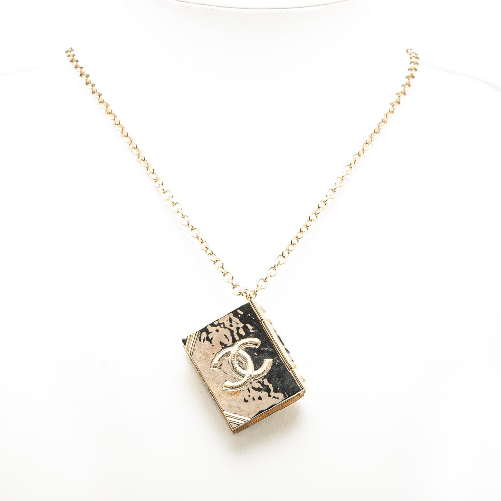 Chanel Gold Plated Enamel CC Lion Book Locket Pendant Necklace - Side view