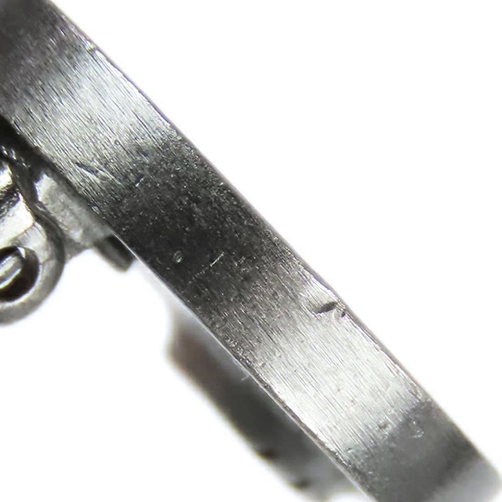 Chanel Silver Plated Leather Logo Clip On Earrings - Side view