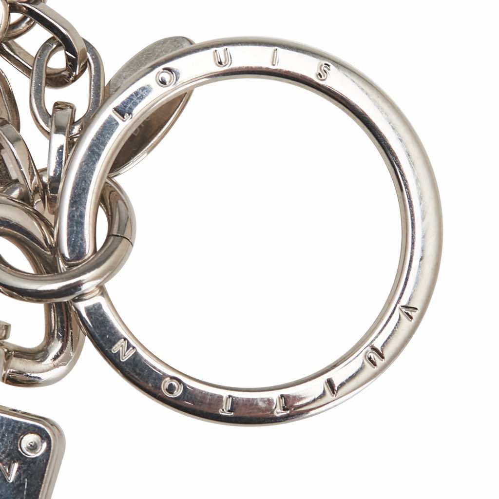 Louis Vuitton Silver Resin LV Twist Key Ring - Side view