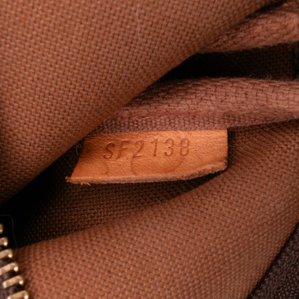 Louis Vuitton Monogram Mini Pochette Accessoires - Detail 1