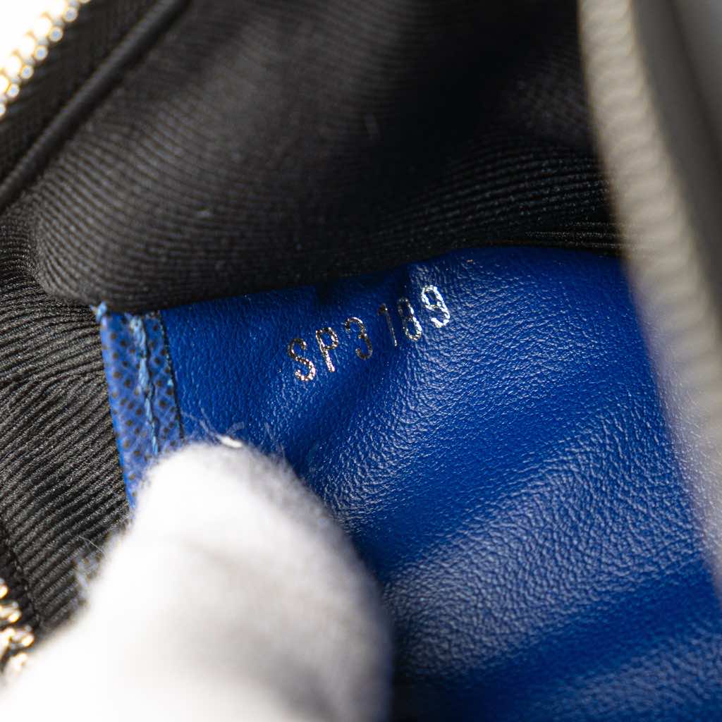 Louis Vuitton Monogram Taigarama Pochette Discovery PM - Detail 1