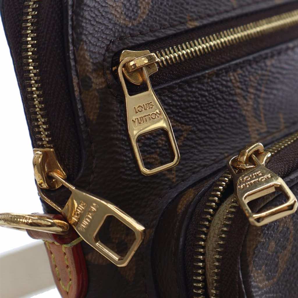 Louis Vuitton Monogram Utility Phone Sleeve - Side view