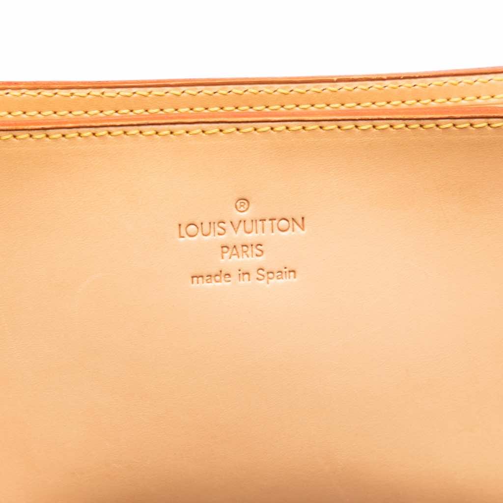 Louis Vuitton Nomade Pochette - Side view