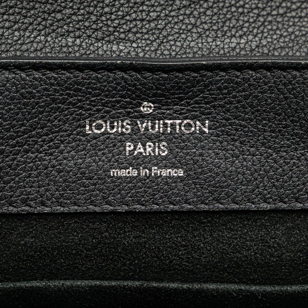 Louis Vuitton Taurillon Lockme Backpack - Side view