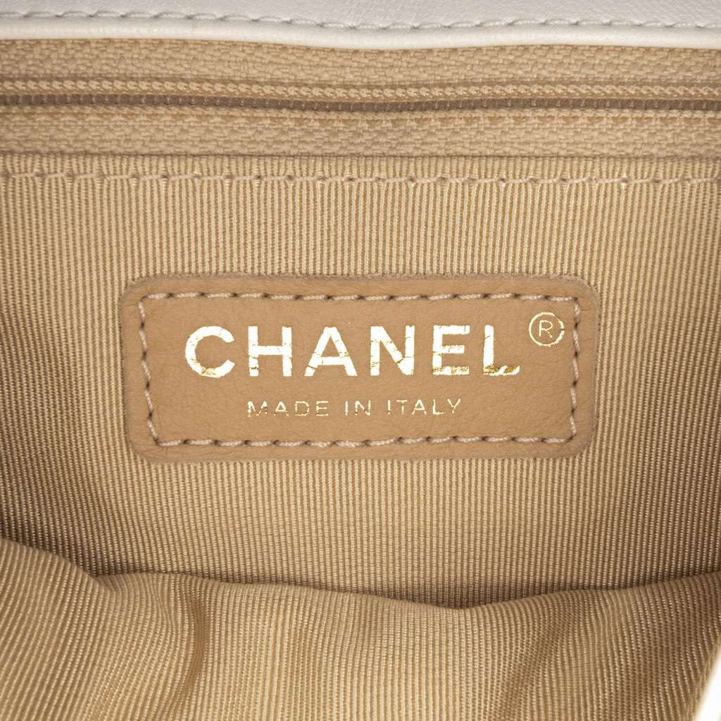 Chanel Quilted Lambskin Studded Beauty Begins Flap - Side view
