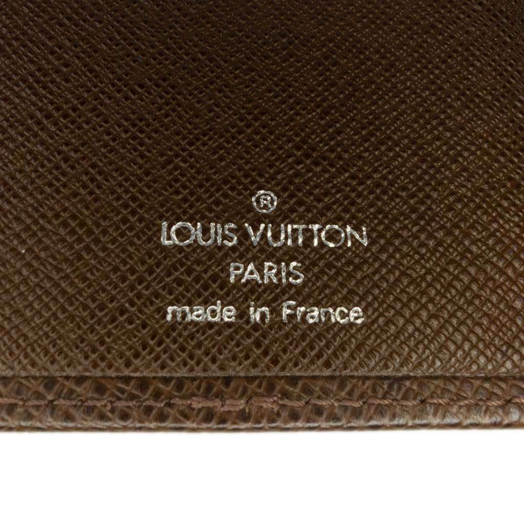 Louis Vuitton Taiga Checkbook Wallet - Side view