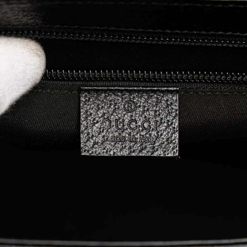 Gucci Studded Leather Clutch - Side view