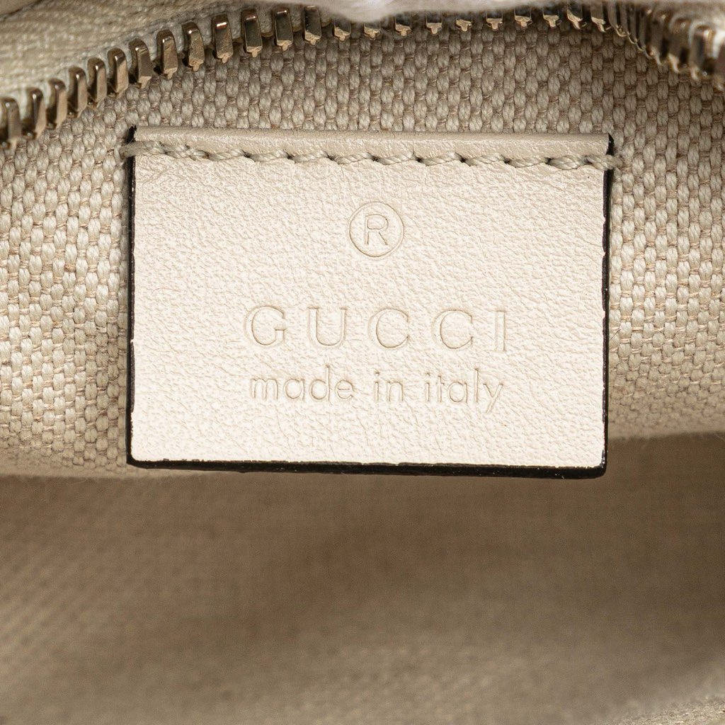 Gucci GG Embossed Perforated Leather Belt Bag - Side view