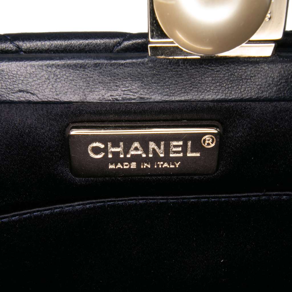 Chanel CC Quilted Lambskin Pearl Clutch - Side view