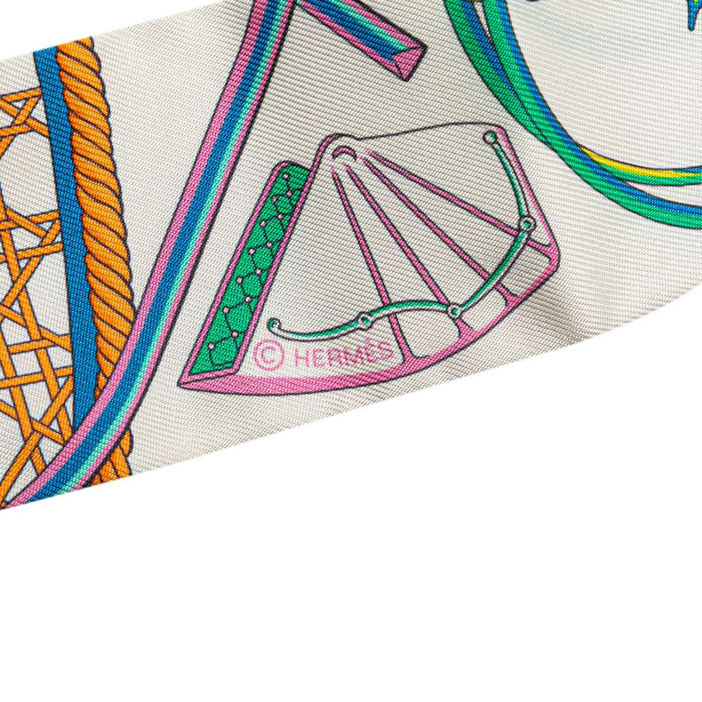 Hermès Les Voitures a Transformation Silk Twilly Scarf - Side view