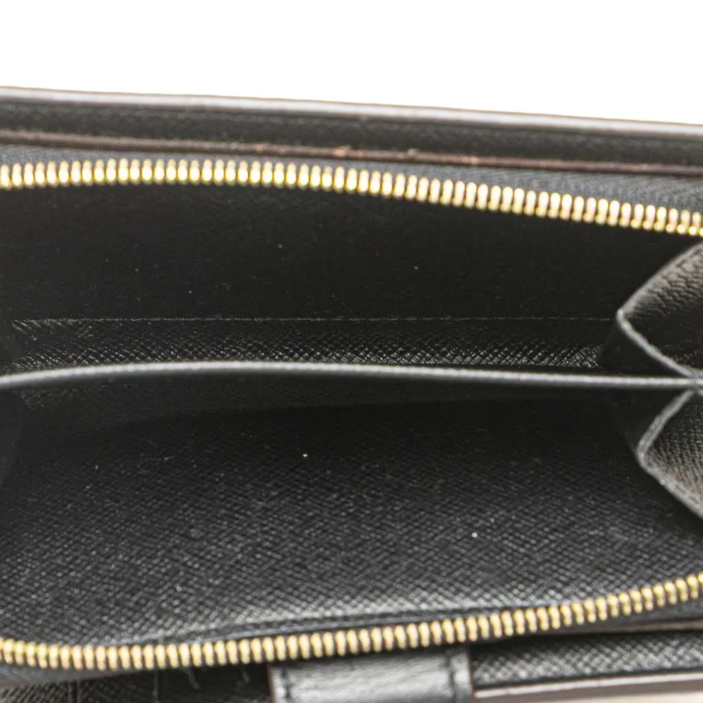 Louis Vuitton Monogram Giant Reverse Juliette Wallet Brown Good - Model View