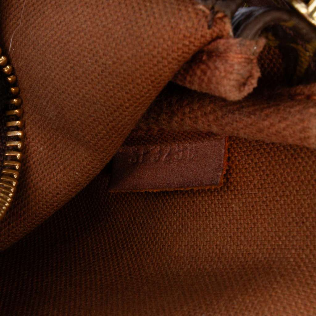 Louis Vuitton Monogram Mini Pochette Accessoires - Side view