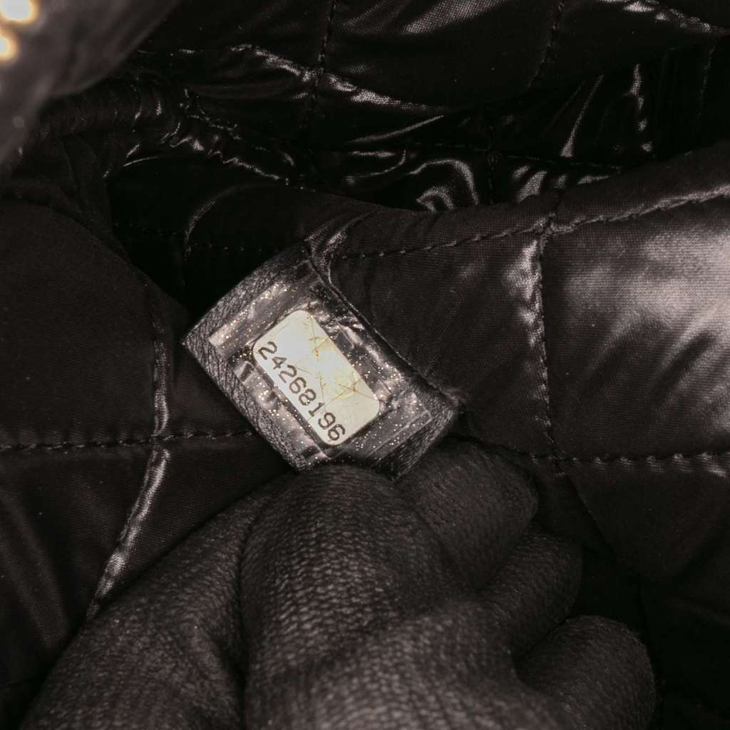 Chanel Medium Quilted Lambskin Double Stitch Tassel O Case Clutch - Side view