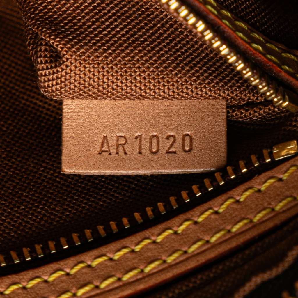 Louis Vuitton Monogram Trotteur - Side view