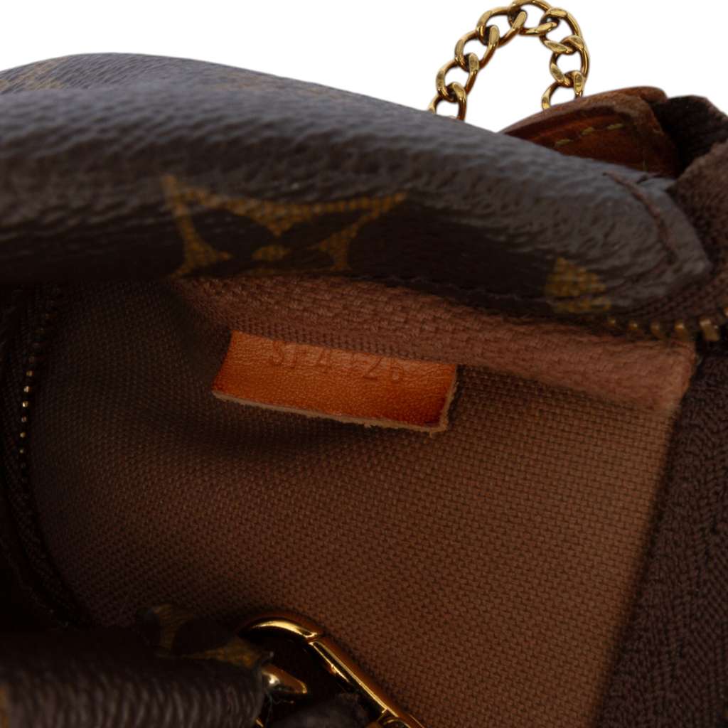 Louis Vuitton Monogram Mini Pochette Accessoires - Detail 1