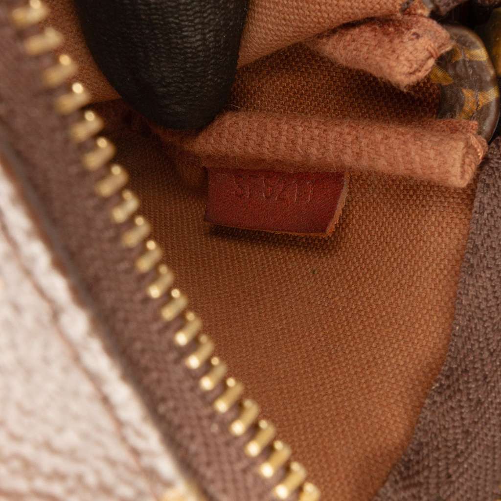 Louis Vuitton Monogram Mini Pochette Accessoires - Side view