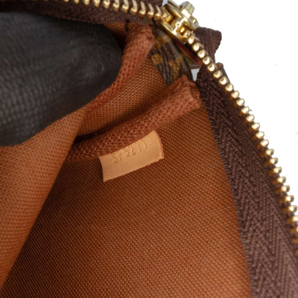 Louis Vuitton Monogram Mini Pochette Accessoires - Side view