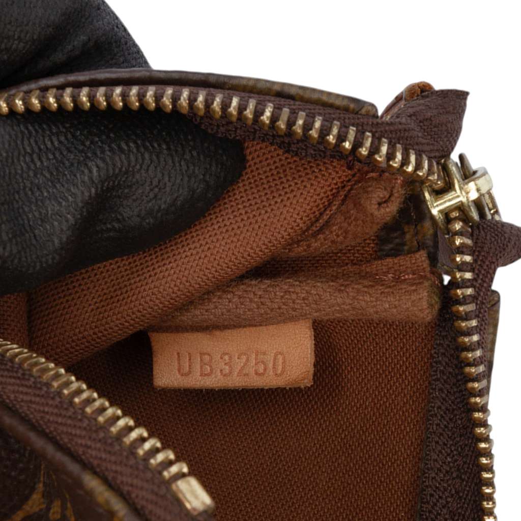 Louis Vuitton Monogram Mini Pochette Accessoires - Side view