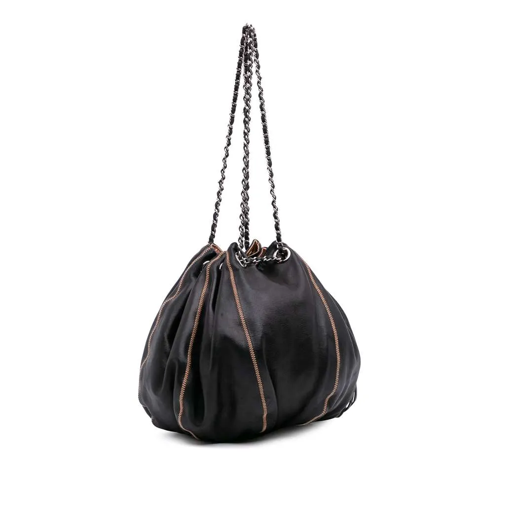 Chanel Lambskin and Satin Reversible Sac Cordon Bucket Bag Black Leather Good - Back View