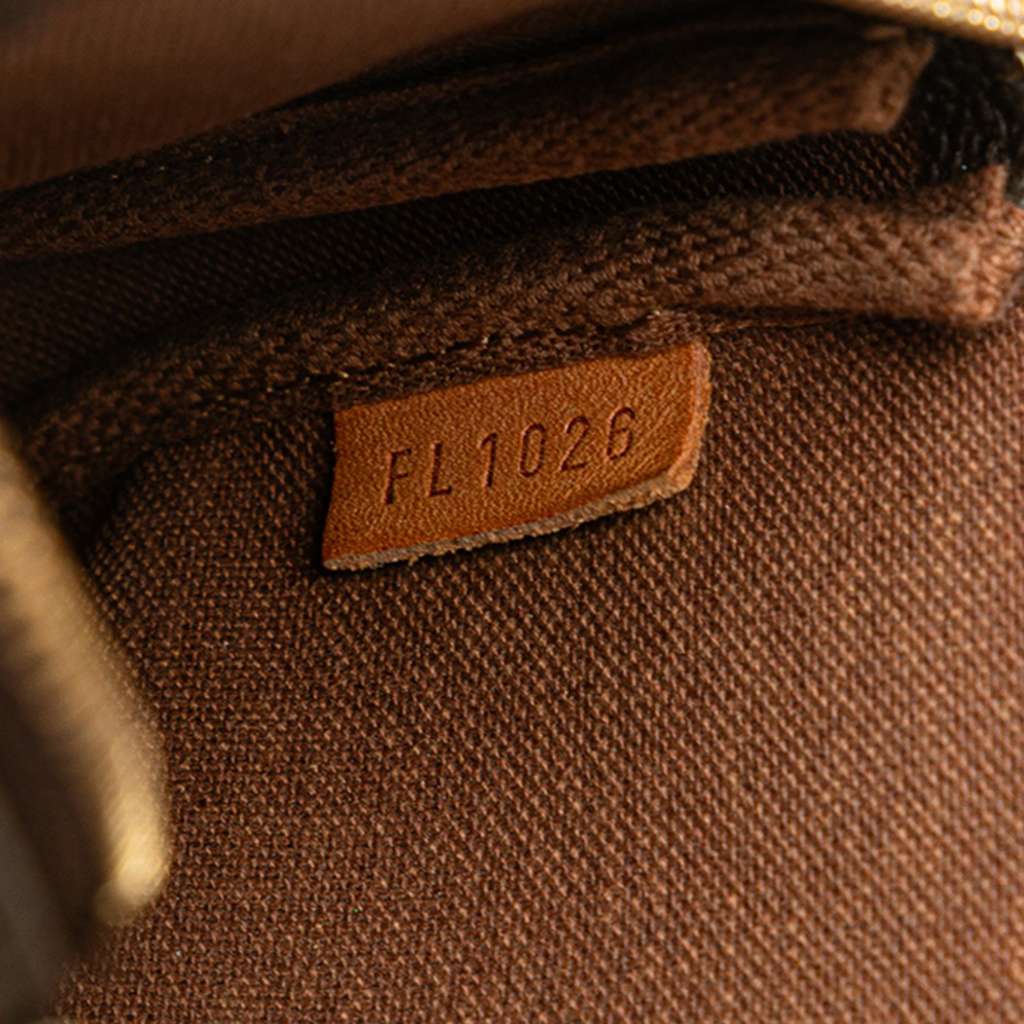 Louis Vuitton Monogram Mini Pochette Accessoires - Side view