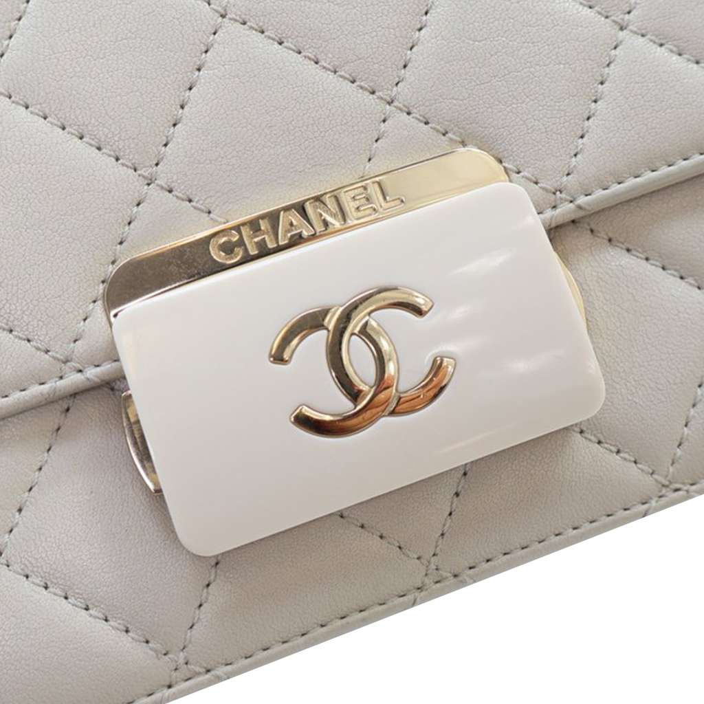 Chanel Mini Sheepskin Beauty Lock Flap - Side view