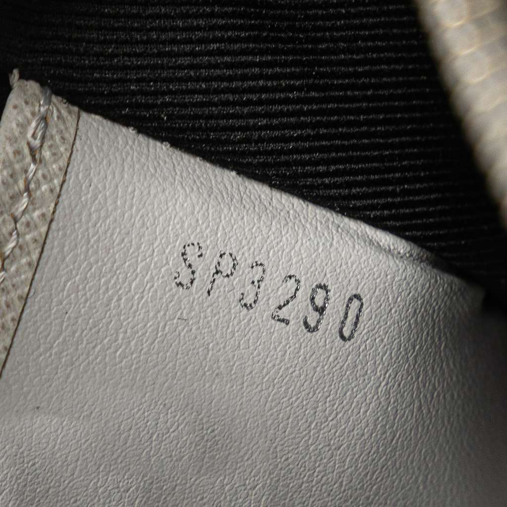 Louis Vuitton Monogram Taigarama Pochette Discovery PM - Detail 1