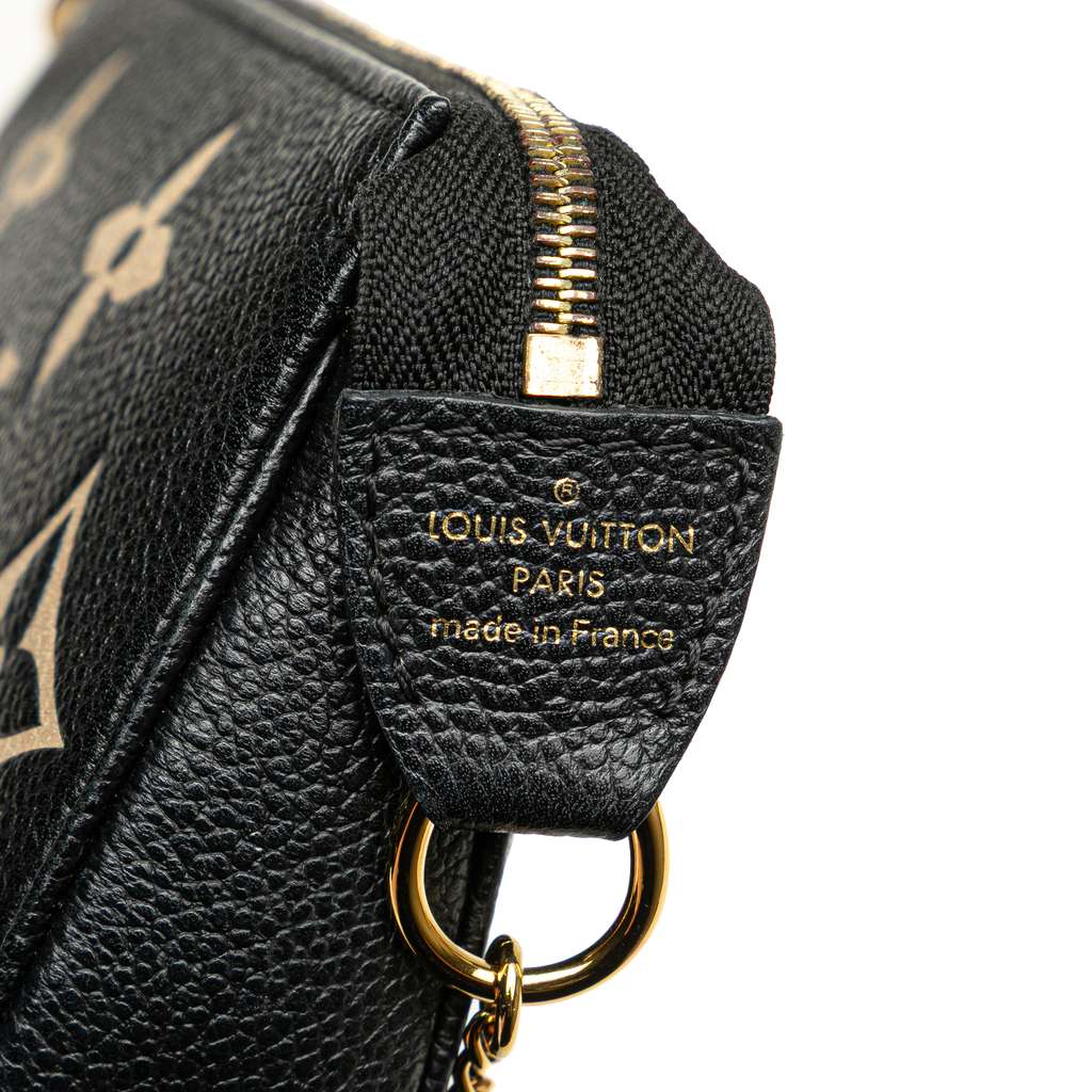 Louis Vuitton Bicolor Monogram Empreinte Mini Pochette Accessoires - Side view