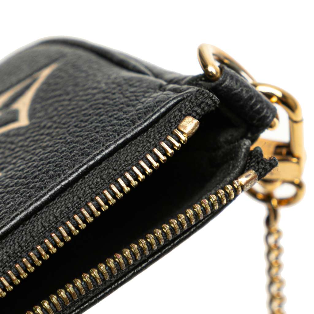 Louis Vuitton Bicolor Monogram Empreinte Mini Pochette Accessoires - Detail 1