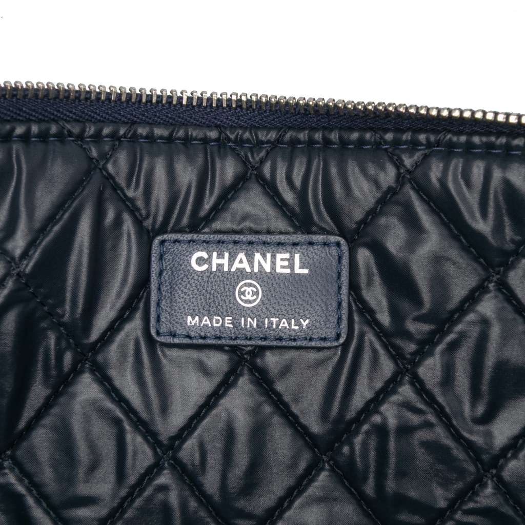 Chanel Large Quilted Lambskin O Case Clutch - Side view