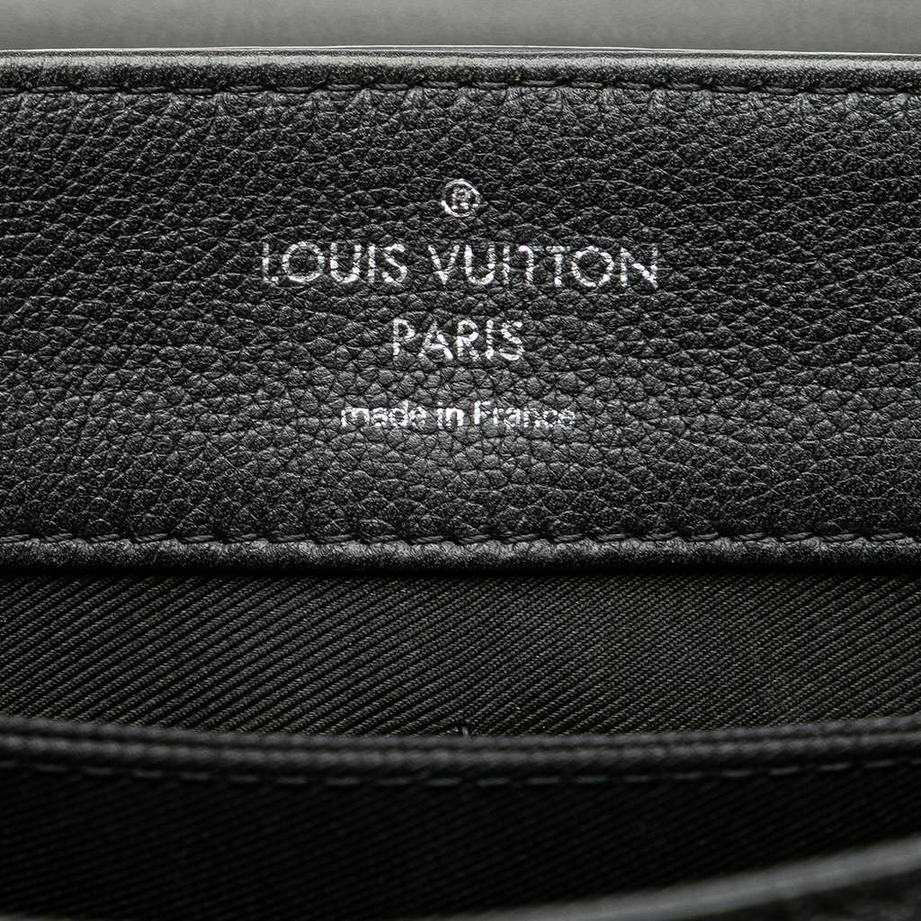 Louis Vuitton Leather Lockme II - Side view