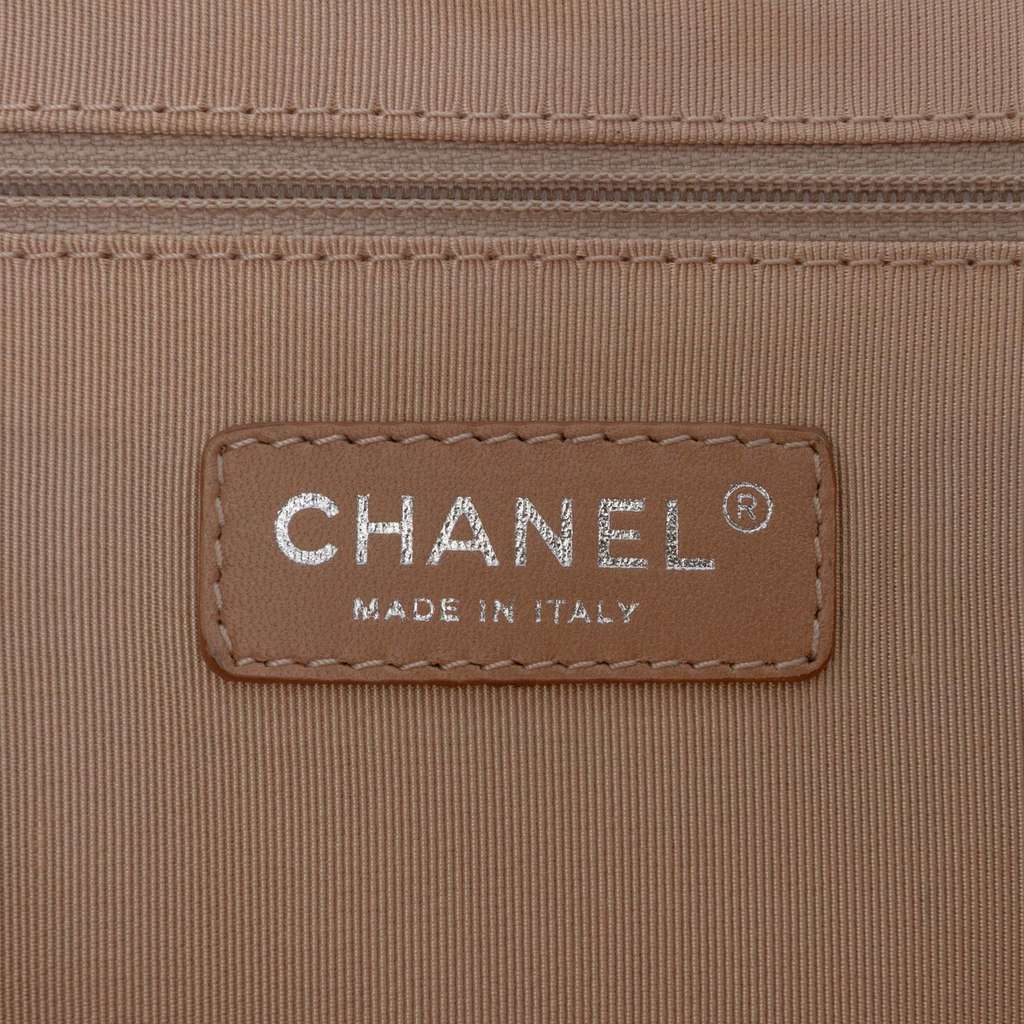 Chanel Quilted Caviar Expandable Zip Tote - Side view