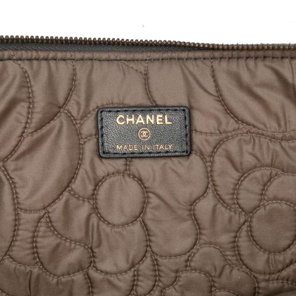 Chanel Large CC Embossed Lambskin Camellia O Case Clutch - Side view