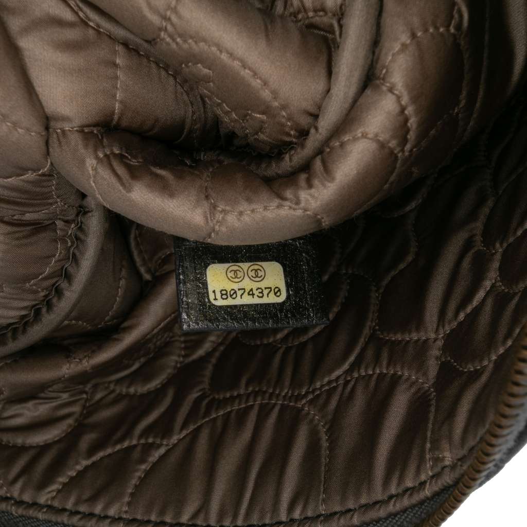 Chanel Large CC Embossed Lambskin Camellia O Case Clutch - Detail 1