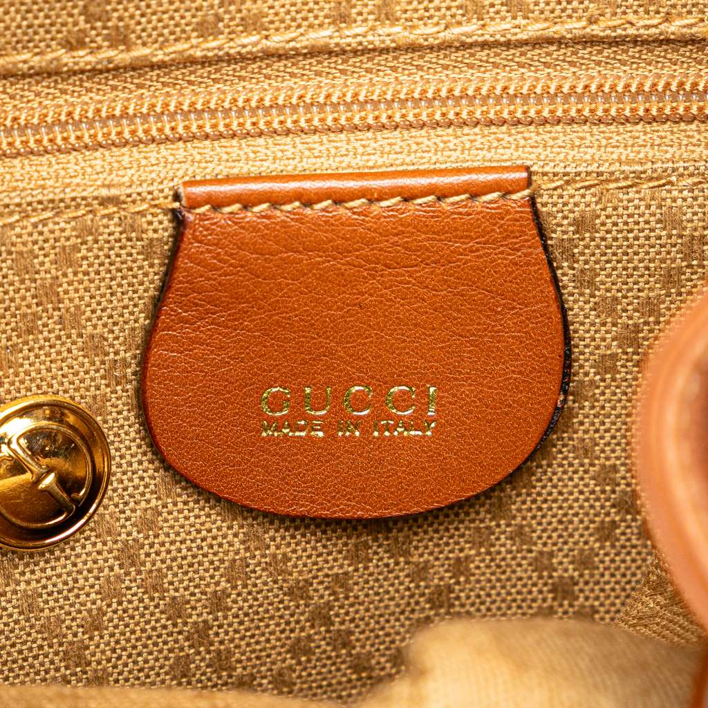 Gucci Leather Bamboo Drawstring Backpack - Side view