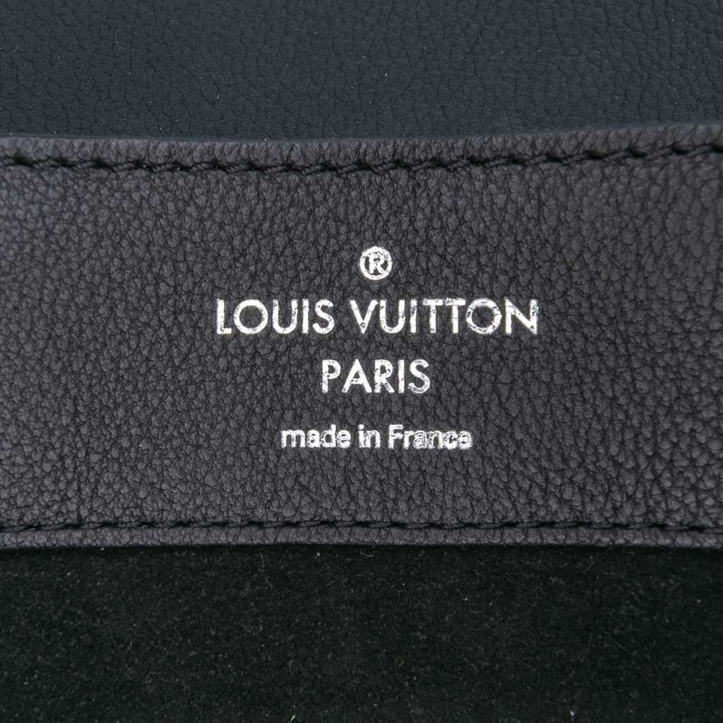 Louis Vuitton Taurillon Lockme Backpack - Side view