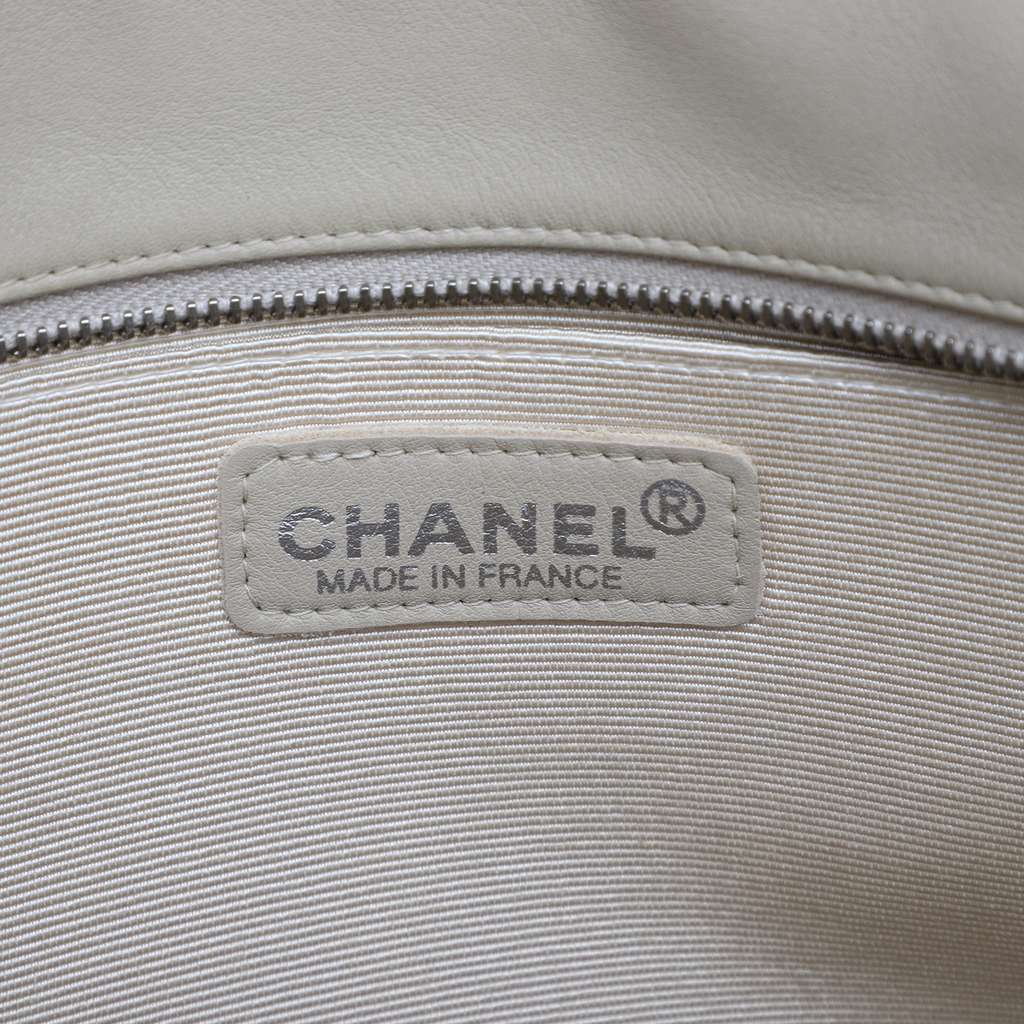 Chanel Lambskin Embossed CC Camellia Tote - Side view