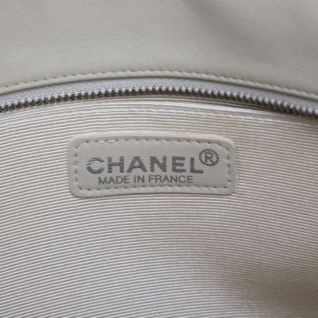Chanel Lambskin Embossed CC Camellia Tote Brown Leather Good - Box View
