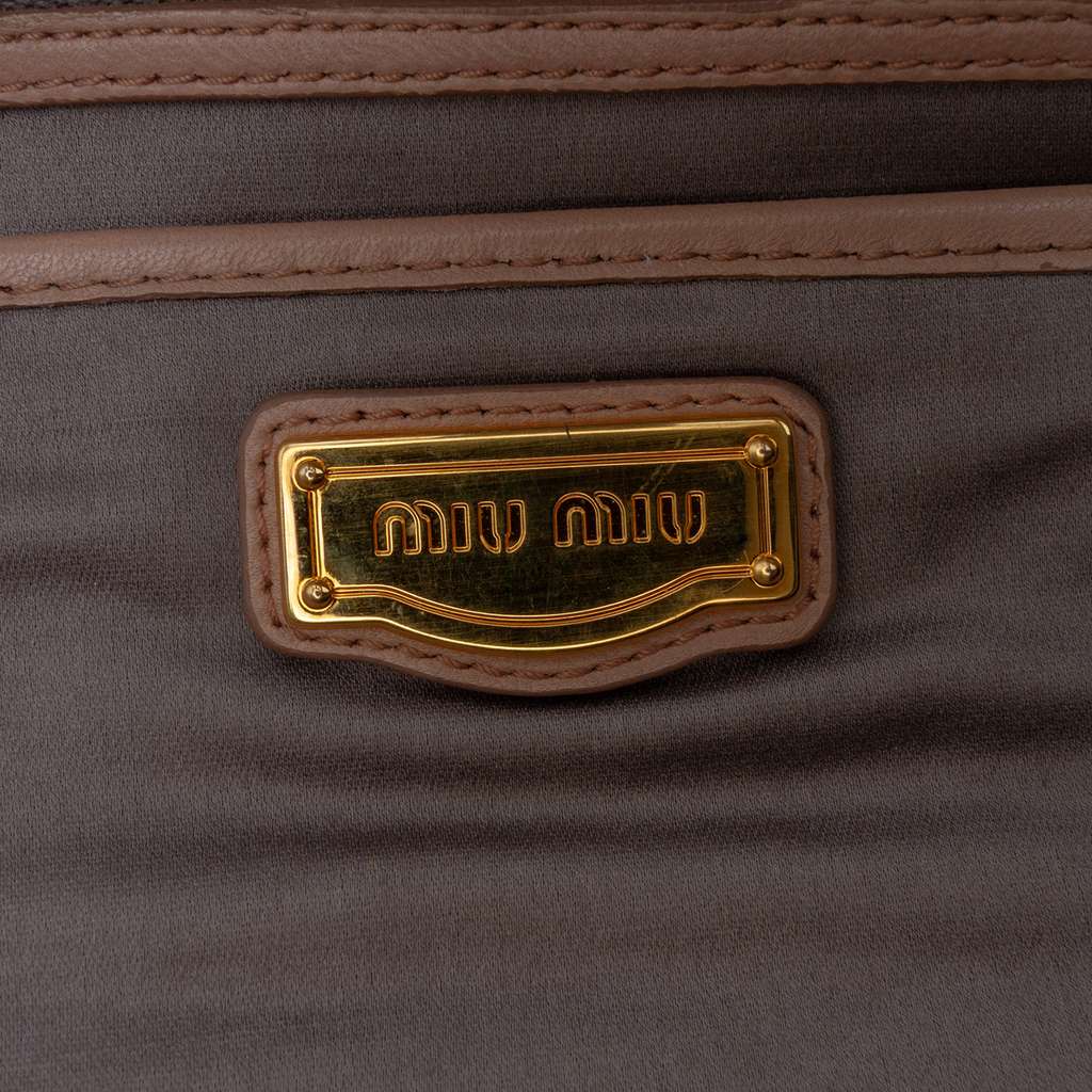 Miu Miu Matelasse Nappa Kiss Lock Clutch on Strap - Side view