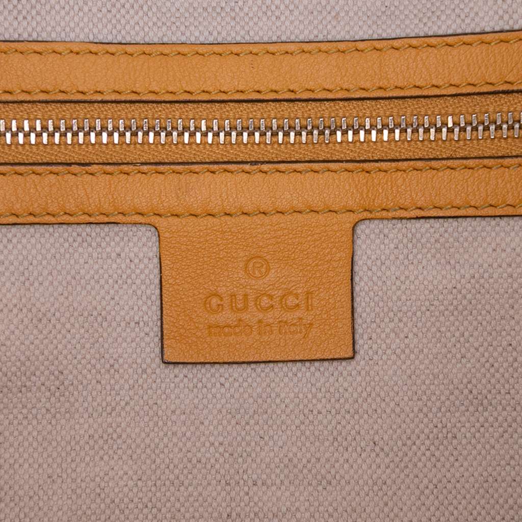 Gucci Microguccissima Patent Stirrup Crossbody - Side view