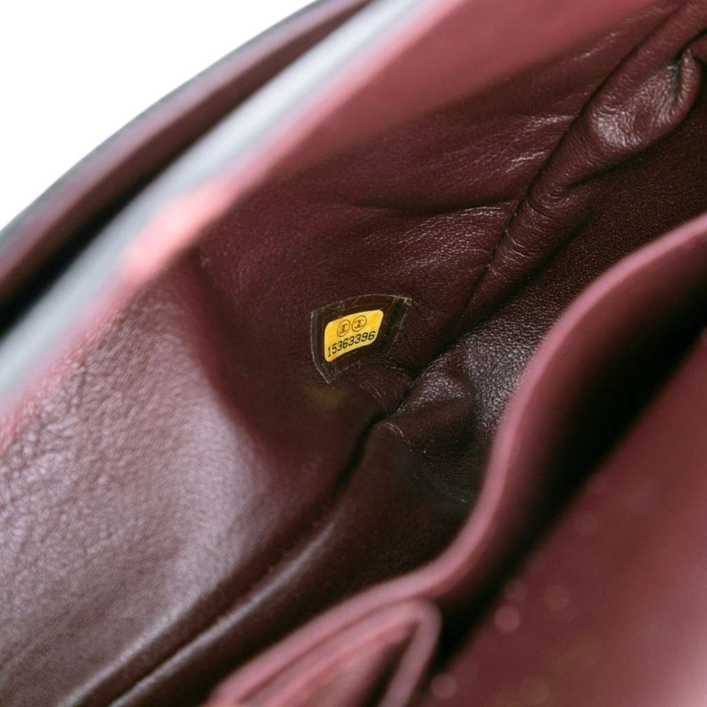 Chanel Maxi Classic Caviar Double Flap - Side view